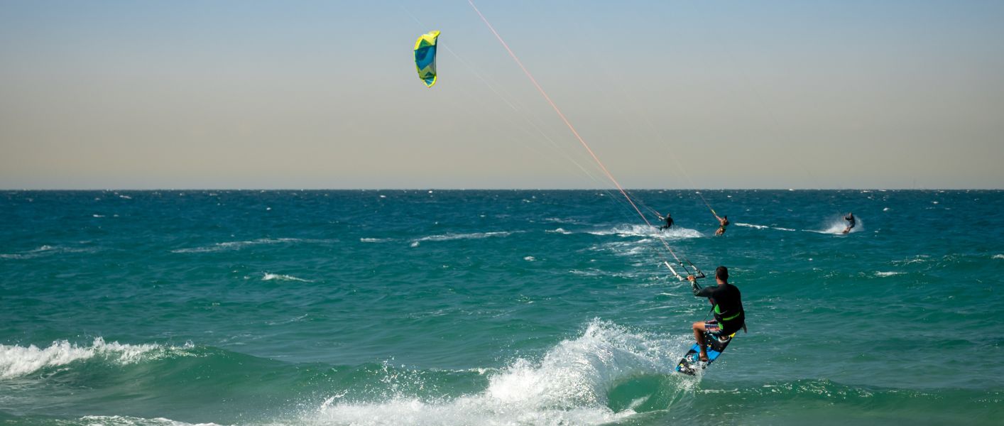 man kite surfing in Egypt's blue waters